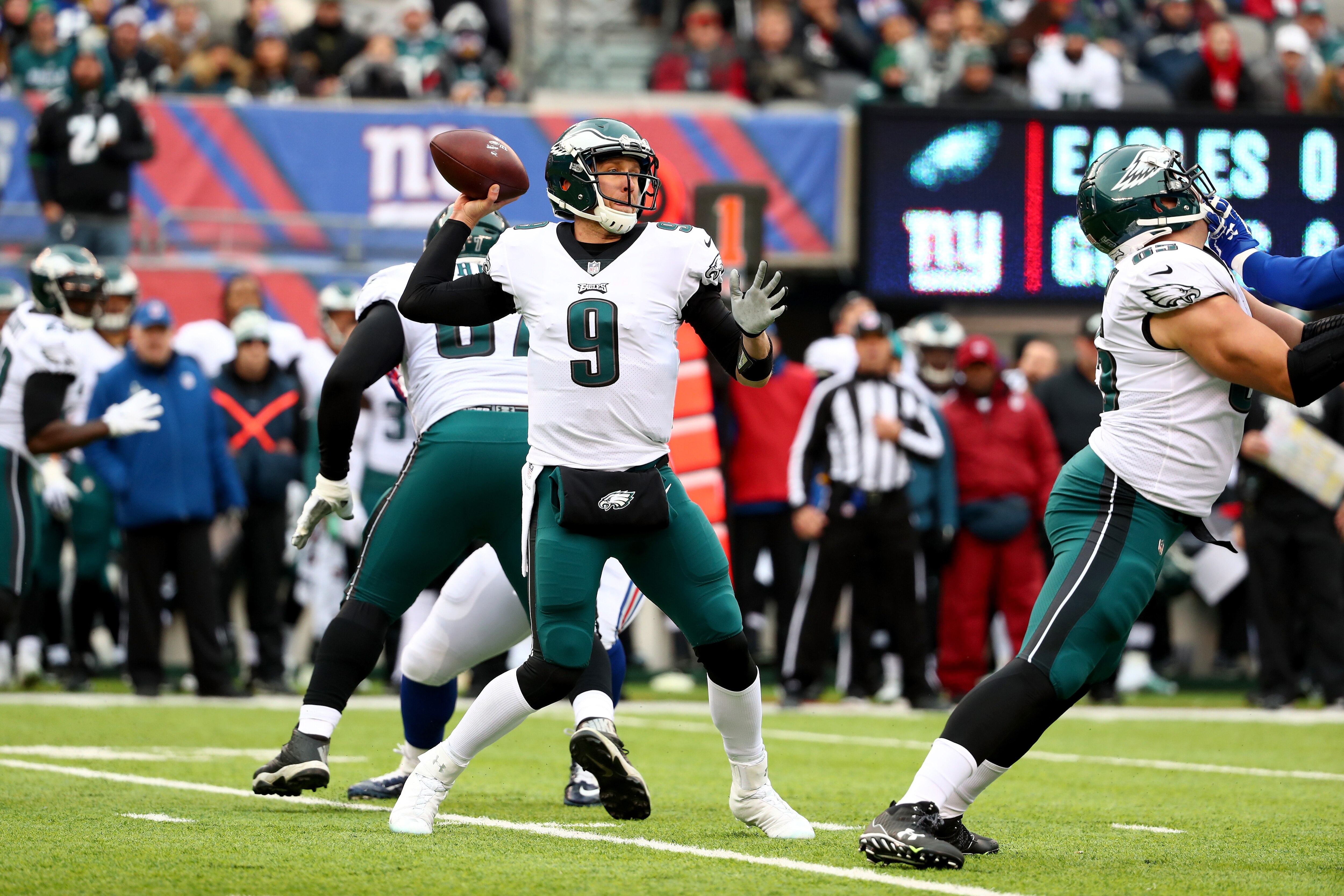 EAST RUTHERFORD, NJ - DECEMBER 17: Nick Foles #9 of the Philadelphia Eagles looks to throw a pass against the New York Giants during the first half in the game at MetLife Stadium on December 17, 2017 in East Rutherford, New Jersey. (Photo by Al Bello/Getty Images)