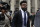 FILE - In this Thursday, Nov. 9, 2017, file photo, Dallas Cowboys NFL football star Ezekiel Elliott walks out of federal court in New York.   Elliott's half-season run from his six-game suspension ended when a federal appeals court refused to let him play while it considers his appeal. (AP Photo/Julie Jacobson, File)