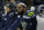 Seattle Seahawks free safety Earl Thomas sits on the bench in the second half of an NFL football game against the Los Angeles Rams, Sunday, Dec. 17, 2017, in Seattle. (AP Photo/Elaine Thompson)