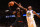 OAKLAND, CA - DECEMBER 25: LeBron James #23 of the Cleveland Cavaliers drives to the basket against Kevin Durant #35 of the Golden State Warriors on December 25, 2017 at ORACLE Arena in Oakland, California. NOTE TO USER: User expressly acknowledges and agrees that, by downloading and or using this photograph, user is consenting to the terms and conditions of Getty Images License Agreement. Mandatory Copyright Notice: Copyright 2017 NBAE (Photo by Noah Graham/NBAE via Getty Images)
