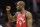 Toronto Raptors' Serge Ibaka (9) celebrates after a dunk against the Charlotte Hornets during the second half of an NBA basketball game in Charlotte, N.C., Wednesday, Dec. 20, 2017. (AP Photo/Chuck Burton)