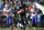 Jacksonville Jaguars quarterback Blake Bortles (5) rushes for yardage past Buffalo Bills outside linebacker Lorenzo Alexander (57) and free safety Jordan Poyer (21) in the first half of an NFL wild-card playoff football game, Sunday, Jan. 7, 2018, in Jacksonville, Fla. (AP Photo/Phelan M. Ebenhack)