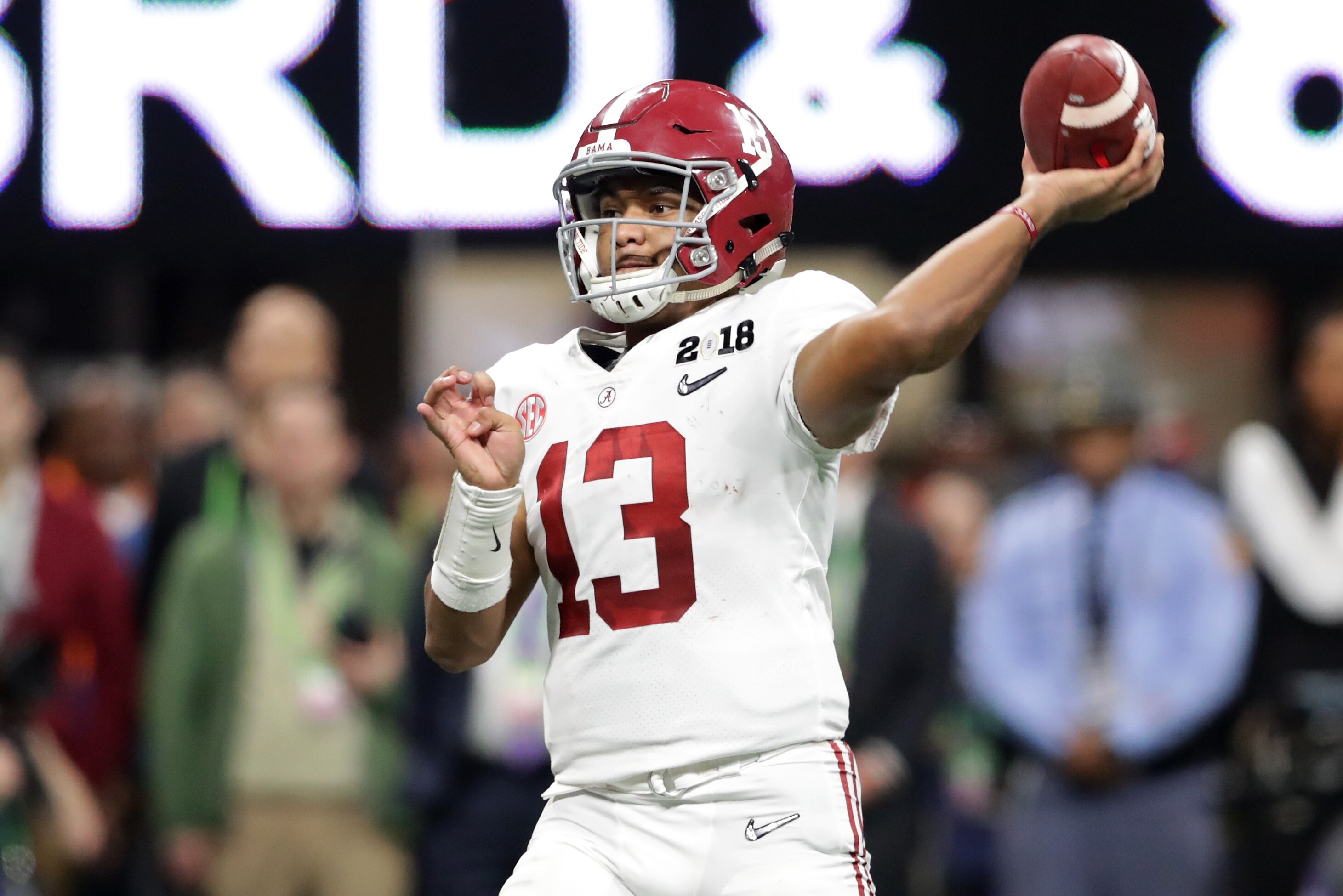ATLANTA, GA - JANUARY 08: Tua Tagovailoa #13 of the Alabama Crimson Tide throws a pass during the second half against the Georgia Bulldogs in the CFP National Championship presented by AT&T at Mercedes-Benz Stadium on January 8, 2018 in Atlanta, Georgia. (Photo by Streeter Lecka/Getty Images)