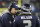 Seattle Seahawks quarterback Russell Wilson (3) confers with offensive coordinator Darrell Bevell, left, in the second half of an NFL football NFC wild card playoff game against the Detroit Lions, Saturday, Jan. 7, 2017, in Seattle. (AP Photo/Elaine Thompson)
