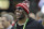 Terrell Owens smiles before the NCAA college football playoff championship game between Georgia and Alabama, Monday, Jan. 8, 2018, in Atlanta. (AP Photo/David J. Phillip)