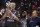 El quarterback Tom Brady, de los Patriots de Nueva Inglaterra, sostiene el Trofeo Vince Lombardi ante la mirada de su entrenador Bill Belichick, derecha, después de la victoria sobre los Falcons de Atlanta en tiempo extra en el Super Bowl, el domingo 5 de febrero de 2017, en Houston. (AP Foto/Darron Cummings)