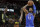 Oklahoma City Thunder's Paul George (13) shoots over Cleveland Cavaliers' Jeff Green (32) in the second half of an NBA basketball game, Saturday, Jan. 20, 2018, in Cleveland. The Thunder won 148-124. (AP Photo/Tony Dejak)