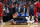 New Orleans Pelicans center DeMarcus Cousins lies on the court after injuring his left achilles tendon, according to the team, in the second half of an NBA basketball game against the Houston Rockets in New Orleans, Friday, Jan. 26, 2018. The Pelicans won 115-113. (AP Photo/Gerald Herbert)