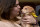 PASADENA, CA - JANUARY 07:  Attendees cuddle with puppies from a local rescue, Paw Works, who are on hand to promote Animal Planets Puppy Bowl XII' during the Discovery Communications TCA Winter 2016 at The Langham Huntington Hotel and Spa on January 7, 2016 in Pasadena, California.  (Photo by Amanda Edwards/Getty Images for Discovery Communications)