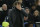 Chelsea manager Antonio Conte, right, looks dejected after Bournemouth's second goal during the English Premier League soccer match between Chelsea and Bournemouth at Stamford Bridge in London, Wednesday Jan. 31, 2018. (AP Photo/Tim Ireland)