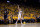 OAKLAND, CA - MAY 03:  Klay Thompson #11 of the Golden State Warriors watches a three-pointer go through the basket against the Memphis Grizzlies during Game One of the Western Conference Semifinals during the NBA Playoffs on May 3, 2015 at Oracle Arena in Oakland, California.  NOTE TO USER: User expressly acknowledges and agrees that, by downloading and or using this photograph, User is consenting to the terms and conditions of the Getty Images License Agreement.  (Photo by Ezra Shaw/Getty Images)