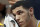 Los Angeles Lakers guard Lonzo Ball (2) wipes his face with a towel as he sits on then bench in the first half of an NBA basketball game against the Dallas Mavericks on Saturday, Jan. 13, 2018, in Dallas. (AP Photo/Tony Gutierrez)
