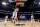 FILE- In this Feb. 20, 2017, file pool photo, Eastern Conference small forward Giannis Antetokounmpo, of the Milwaukee Bucks, dunks as Western Conference guard Stephen Curry, bottom, of the Golden State Warriors, lies on the court during the first half of the NBA All-Star basketball game in New Orleans. The NBA is scrapping the East against West format for its All-Star Game and will have captains pick teams this season. (AP Photo/Max Becherer, Pool, File)