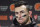 FILE - In this Dec. 20, 2015, file photo, Cleveland Browns quarterback Johnny Manziel speaks with media members following the team's 30-13 loss to the Seattle Seahawks in an NFL football game in Seattle. New Orleans Saints coach Sean Payton shot down a report that his team had interest in troubled quarterback Johnny Manziel. They did meet during Super Bowl week, but Payton called the report the team was considering adding Manziel