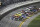 Alex Bowman (88) leads the field at the start of the first of two qualifying races for the NASCAR Daytona 500 auto race at Daytona International Speedway in Daytona Beach, Fla., Thursday, Feb. 15, 2018. (AP Photo/David Graham)