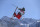 FILE - In this Feb. 13, 2014, file photo, Gus Kenworthy of the United States competes in the men's ski slopestyle final to win the silver medal at the Rosa Khutor Extreme Park, at the 2014 Winter Olympics, in Krasnaya Polyana, Russia. Kenworthy already has an Olympic medal, from Sochi, and the chance for another at the games in Pyeongchang. But what gives the skier even greater satisfaction than winning is when his pioneering and still rare example as an openly gay athlete encourages others be open about themselves, too. (AP Photo/Sergei Grits, File)