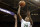 Oregon's Ruthy Hebard (24) shoots over Washington's Khayla Rooks during the second half of an NCAA college basketball game Friday, Feb. 9, 2018, in Seattle. (AP Photo/Elaine Thompson)