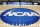 FILE - In this March 18, 2015, file photo, the NCAA logo is at center court as work continues at The Consol Energy Center in Pittsburgh, for the NCAA college basketball second and third round games.  The NCAA and 11 major athletic conferences announced Friday, Feb. 3, 2017,  they have agreed to pay $208.7 million to settle a federal class-action lawsuit filed by former college athletes who claimed the value of their scholarships was illegally capped. (AP Photo/Keith Srakocic, File)