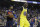 Golden State Warriors' Draymond Green, right, celebrates after dunking in front of Oklahoma City Thunder's Paul George, left, during the second half of an NBA basketball game Saturday, Feb. 24, 2018, in Oakland, Calif. (AP Photo/Marcio Jose Sanchez)