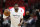Miami Heat guard Dwyane Wade warms up before the start of an NBA basketball game against the Milwaukee Bucks, Friday, Feb. 9, 2018, in Miami. Wade was traded back to the Heat from the Cleveland Cavaliers on Thursday. (AP Photo/Wilfredo Lee)