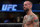 CM Punk stands in the octagon after being defeated by Mickey Gall during a welterweight bout at UFC 203 on Saturday, Sept. 10, 2016, in Cleveland.  (AP Photo/David Dermer)