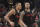 Portland Trail Blazers guards CJ McCollum, left, and Damian Lillard react after McCollum hit a 3-point shot during the second half of the team's NBA basketball game against the Golden State Warriors in Portland, Ore., Friday, March 9, 2018. The Blazers won 125-108. (AP Photo/Steve Dykes)
