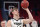 Purdue center Isaac Haas shoots during warmups before a second round game against Butler in the NCAA college basketball tournament, Sunday, March 18, 2018, in Detroit. A day after Isaac Haas' season was declared over, there's now a bit of mystery surrounding the status of Purdue's star center. That could be encouraging news for the second-seeded Boilermakers, who announced Friday that Haas would miss the rest of the NCAA Tournament with a broken elbow. On Saturday, a CBS reporter tweeted that Haas had practiced with the team, although coach Matt Painter tried to keep expectations low for a possible return. (AP Photo/Carlos Osorio)