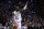 Boston Celtics guard Kyrie Irving (11) calls to teammates during the first quarter of an NBA basketball game in Boston, Wednesday, Feb. 28, 2018. (AP Photo/Charles Krupa)