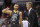 Golden State Warriors guard Stephen Curry, left, laughs with Warriors cach Steve Kerr during the first half of the team's NBA basketball game against the Washington Wizards, Wednesday, Feb. 28, 2018, in Washington. (AP Photo/Nick Wass)