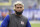 File-This Oct. 8, 2017, file photo shows New York Giants wide receiver Odell Beckham warming up prior to an NFL football game against the Los Angeles Chargers in East Rutherford, N.J.  New York Giants owner John Mara says the team does not have Odell Beckham Jr., on the trading block, then stopped short Sunday of saying the controversial star receiver is an untouchable. (AP Photo/Bill Kostroun, File)