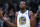 Golden State Warriors forward Kevin Durant reacts to calls from fans at the close of the team's NBA basketball game against the Denver Nuggets on Saturday, Feb. 3, 2018, in Denver. The Nuggets won 115-108. (AP Photo/David Zalubowski)
