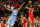 HOUSTON, TX - MARCH 15:  James Harden #13 of the Houston Rockets shoots a three point basket over the outstretched hand of Sindarius Thornwell #0 of the LA Clippers  at Toyota Center on March 15, 2018 in Houston, Texas. NOTE TO USER: User expressly acknowledges and agrees that, by downloading and or using this photograph, User is consenting to the terms and conditions of the Getty Images License Agreement.  (Photo by Bob Levey/Getty Images)