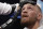 Conor McGregor sits in his corner between rounds in a super welterweight boxing match against Floyd Mayweather Jr., Saturday, Aug. 26, 2017, in Las Vegas. (AP Photo/Isaac Brekken)