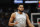 Minnesota Timberwolves center Karl-Anthony Towns (32) in the second half of an NBA basketball game Thursday, April 5, 2018, in Denver. The Nuggets won 100-96. (AP Photo/David Zalubowski)