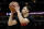 Chicago Bulls guard Zach LaVine warms up before the second half of an NBA basketball game against the Toronto Raptors, Wednesday, Feb. 14, 2018, in Chicago. The Raptors won 122-98. (AP Photo/Nam Y. Huh)