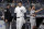 New York Yankees' Giancarlo Stanton walks back to the dugout after striking out against the Miami Marlins during the seventh inning of a baseball game, Monday, April 16, 2018, in New York. (AP Photo/Julie Jacobson)