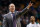 Atlanta Hawks head coach Mike Budenholzer signals during the third quarter of an NBA basketball game against the Boston Celtics in Boston, Sunday, April 8, 2018. The Hawks won 112-106. (AP Photo/Michael Dwyer)