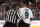 GLENDALE, NV - APRIL 26:  Evander Kane #9 of the San Jose Sharks is escorted off the ice by linesman Greg Devorski #54 after a 5 minute major penalty and game misconduct in the third period Game One of the Western Conference Second Round against the Vegas Golden Knights during the 2018 NHL Stanley Cup Playoffs at T-Mobile Arena on April 26, 2018 in Las Vegas, Nevada. The Golden Knights defeated the Sharks 7-0.  (Photo by Christian Petersen/Getty Images)