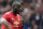 Manchester United's Belgian striker Romelu Lukaku gestures as he leaves the field at half time during the English Premier League football match between Manchester United and Arsenal at Old Trafford in Manchester, north west England, on April 29, 2018. (Photo by Paul ELLIS / AFP) / RESTRICTED TO EDITORIAL USE. No use with unauthorized audio, video, data, fixture lists, club/league logos or 'live' services. Online in-match use limited to 75 images, no video emulation. No use in betting, games or single club/league/player publications. /         (Photo credit should read PAUL ELLIS/AFP/Getty Images)