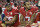 San Francisco 49ers safety Eric Reid (35) and quarterback Colin Kaepernick (7) kneel during the national anthem before an NFL football game against the Los Angeles Rams in Santa Clara, Calif., Monday, Sept. 12, 2016. (AP Photo/Marcio Jose Sanchez)