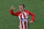 Atletico's Antoine Griezmann's celebrates his side opening goal during the Europa League Final soccer match between Marseille and Atletico Madrid at the Stade de Lyon outside Lyon, France, Wednesday, May 16, 2018. (AP Photo/Christophe Ena)