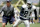 Dallas Cowboys offensive coordinator Jason Garrett, left, and wide receiver Terrell Owens (81) during NFL football training camp, Tuesday, July 29, 2008, in Oxnard, Calif. (AP Photo/Tony Gutierrez)