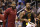 Cleveland Cavaliers forward LeBron James (23) and JR Smith (5) in the second half during an NBA basketball game against the Phoenix Suns, Tuesday, March 13, 2018, in Phoenix. The Cavaliers defeated the Suns 129-107. (AP Photo/Rick Scuteri)