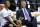 Portland Trail Blazers' Damian Lillard, left, chats with Trail Blazers GM Neil Olshey prior to the start of an NBA basketball game in Portland, Ore., Saturday, March 28, 2015. (AP Photo/Greg Wahl-Stephens)