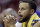 Golden State Warriors guard Stephen Curry sits on the bench during the final moments of the second half in Game 2 of the NBA basketball Western Conference Finals against the Houston Rockets, Wednesday, May 16, 2018, in Houston. (AP Photo/David J. Phillip)