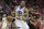 Golden State Warriors forward Andre Iguodala (9) is fouled by Houston Rockets guard Chris Paul (3) during the second half of Game 1 of the NBA basketball Western Conference Finals, Monday, May 14, 2018, in Houston. (AP Photo/David J. Phillip)