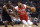 New Orleans Pelicans forward Anthony Davis (23) drives to the basket as Houston Rockets center Clint Capela, left, defends during the first half of an NBA basketball game Saturday, March 24, 2018, in Houston. (AP Photo/Eric Christian Smith)