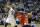Philadelphia 76ers' Royal Ivey (7) drives against Utah Jazz's Randy Foye (8) in the first quarter during an NBA basketball game Monday, March 25, 2013, in Salt Lake City. (AP Photo/Rick Bowmer)