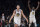 Golden State Warriors guard Klay Thompson (11) and forward Draymond Green (23) reacts after Thompson scored a three-point basket during the final minutes of the second half of an NBA basketball game against the Brooklyn Nets, Sunday, Nov. 19, 2017, in New York. (AP Photo/Mary Altaffer)