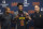 Cleveland Cavaliers first round draft selection, Collin Sexton, center, displays his jersey with Cavaliers general manager Koby Altman, left and Cavaliers head coach Tyronn Lue during a news conference at the Cavaliers training facility in Independence, Ohio, Friday, June 22, 2018.  (AP Photo/Phil Long)